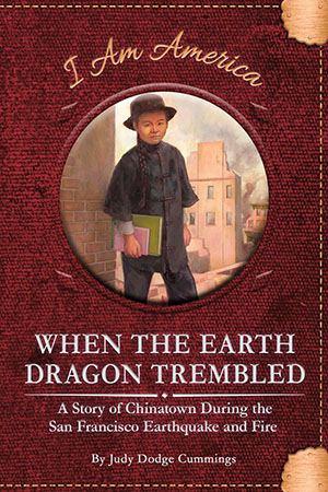 It’s 1906, and strict immigration laws have divided Han Liu’s family. His mother and sister are in China, while he and his father live in San Francisco, California. Han resists his father’s attempts to teach him traditional Chinese values. Han is an American, after all, and he’d rather read The Adventures of Tom Sawyer than study Chinese proverbs. But when a massive earthquake and fire destroy Chinatown and separate Han from his father, those proverbs are all he has left. Can Han use the wisdom of his family to survive the earthquake and fire, reunite with his father, and rebuild their life?

It’s the storytellers that preserve a nation’s history. But what happens when some stories are silenced? The I Am America series features fictional stories based on important historical events about people whose voices have been excluded, lost, or forgotten over time. Preview this book.